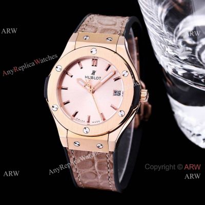 AAA Replica Hublot Classic Fusion Quartz 33 mm Rose Gold Salmon Dial